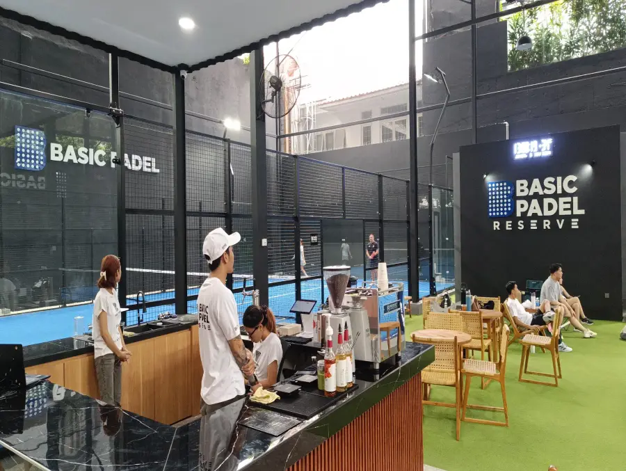 Coffee bar beside the courts with players relaxing