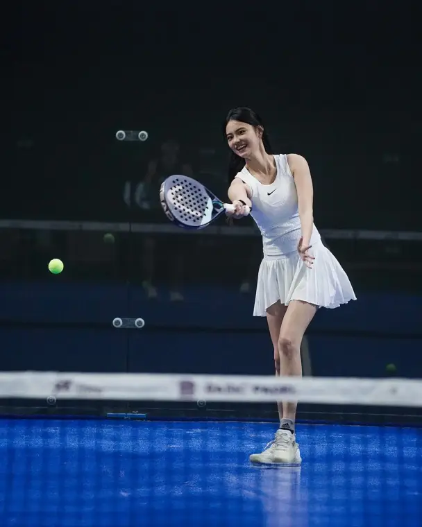 Player in white at the net